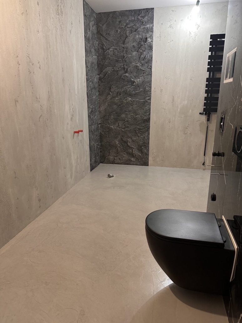 Mikrocement na ścianie – beton dekoracyjny w salonie | Zement